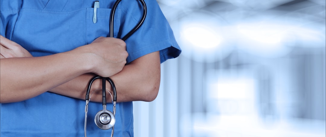 services-04 a-person-in-scrubs-with-a-stethoscope-on-their-arm-1bcqaroqvxy